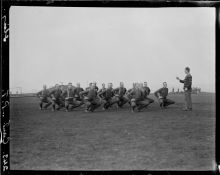 New Zealand soldiers from the Canterbury Battalion exercising under direction from their instructor. Sling Camp, Bulford, England.